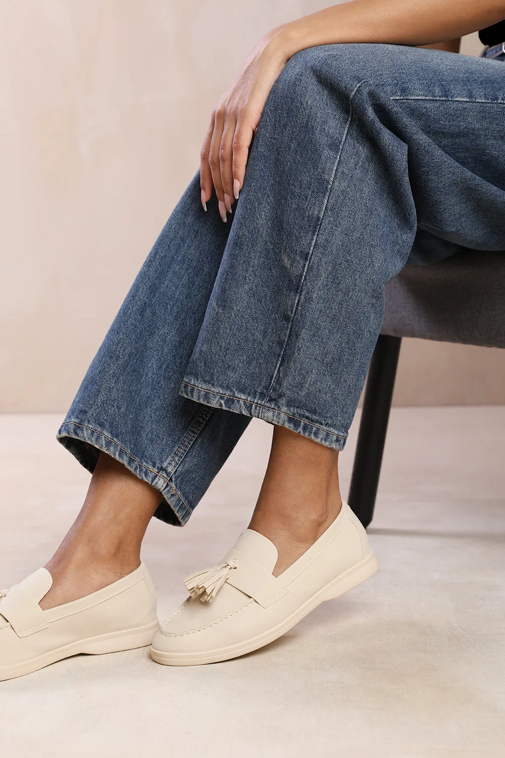 KENYA SLIP ON LOAFER WITH TASSEL DETAILING IN BEIGE SUEDE